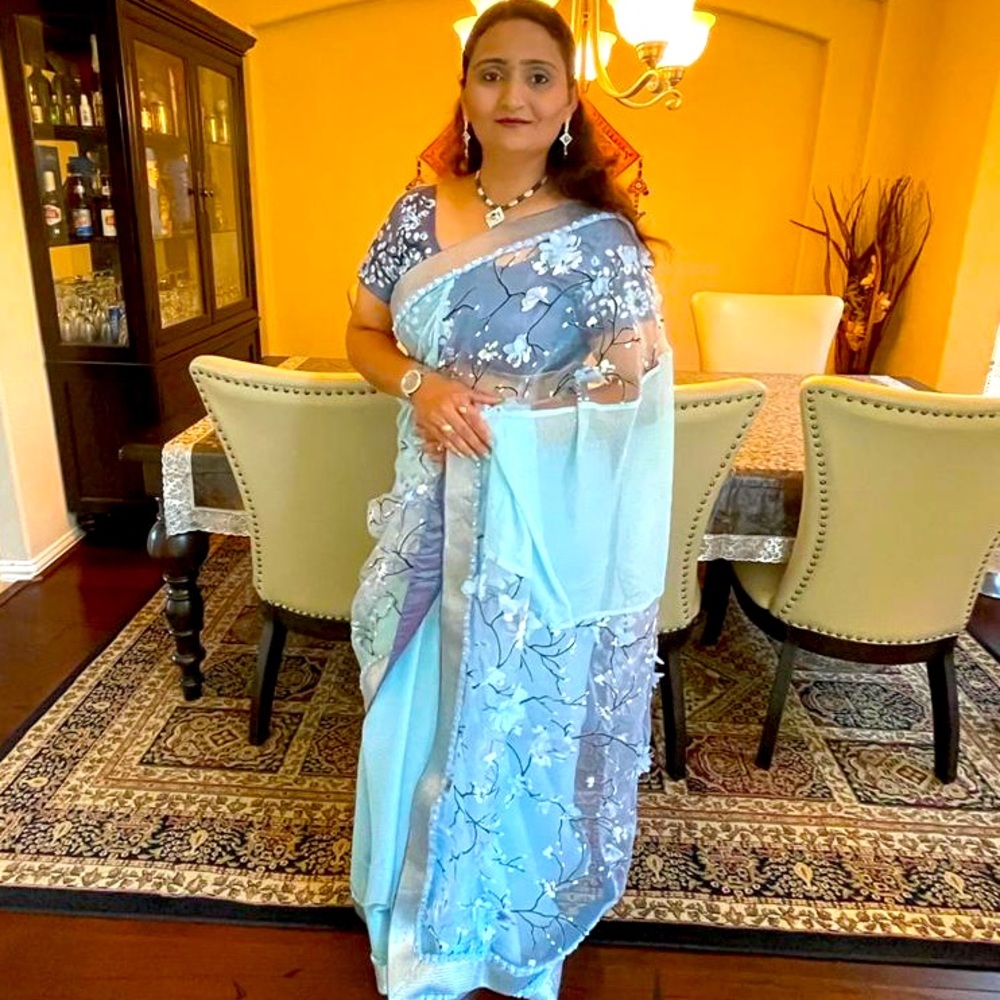 Baby blue Floral sari with stitched blouse. Size XL.